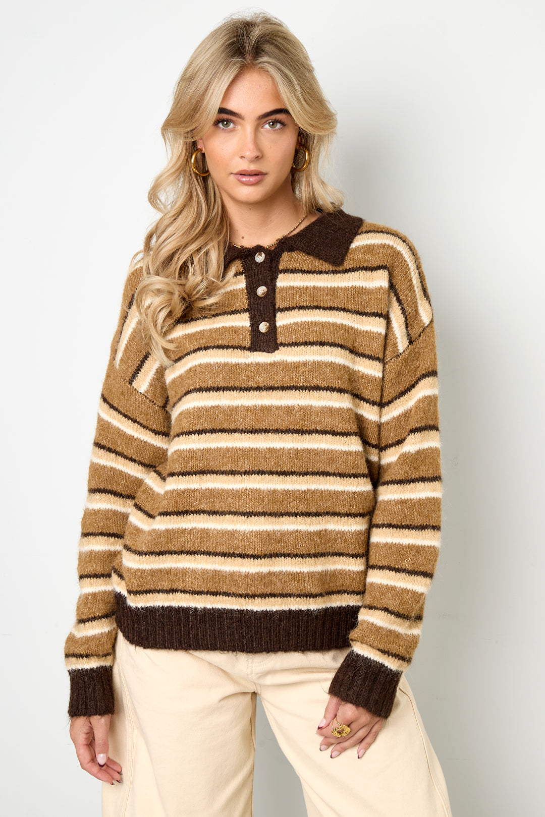 Knitted polo sweater with stripes